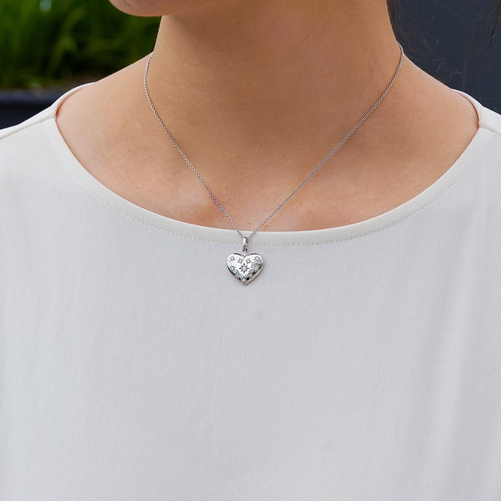 Hallmark Fine Jewelry Superstar Heart Pendant in Sterling Silver with Diamond