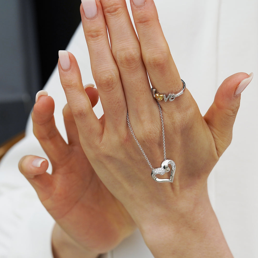 Hallmark Fine Jewelry Sparkling Heart Pendant in Sterling Silver with 1/8 Cttw of Diamonds