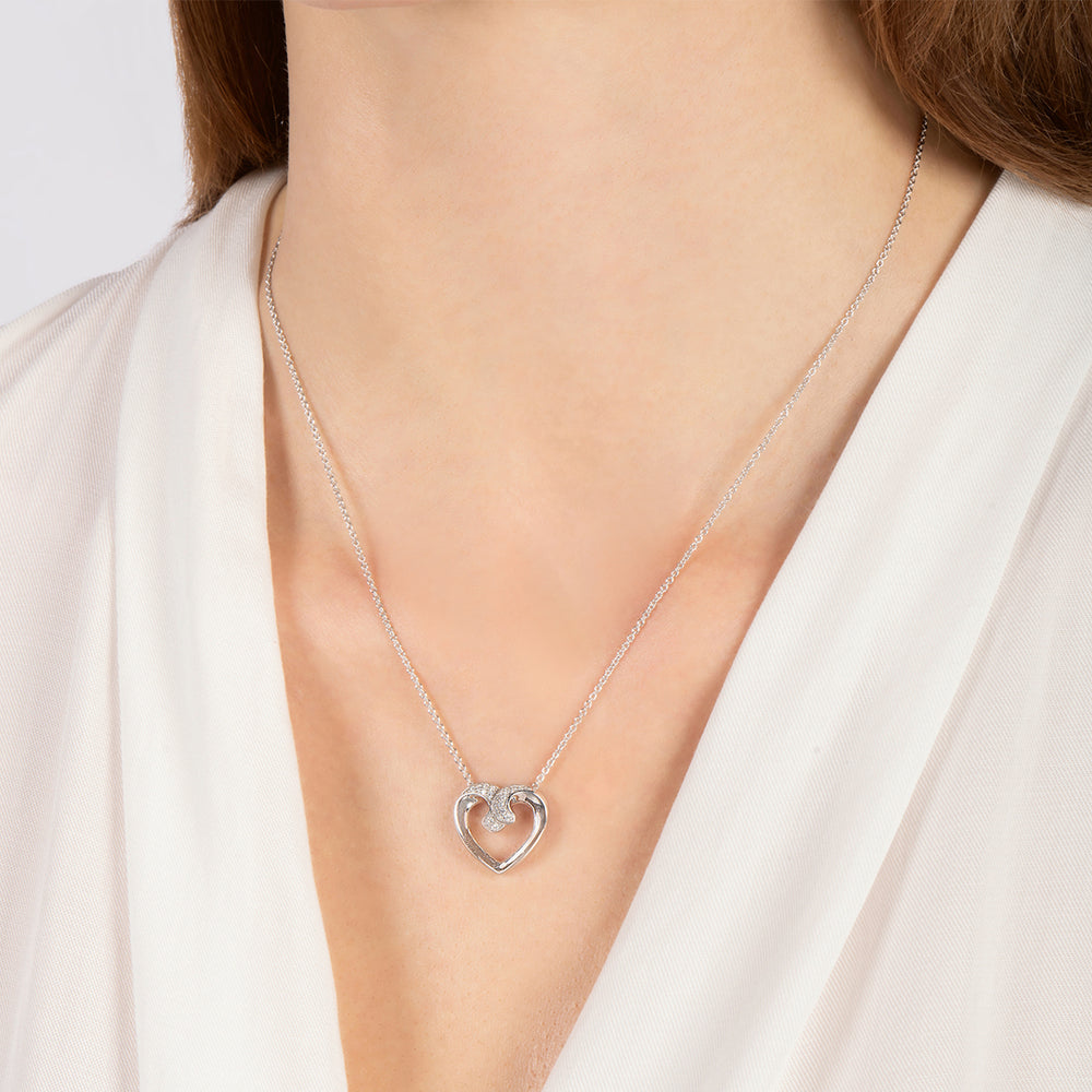 Hallmark Fine Jewelry Hugging Heart Pendant in Sterling Silver with 1/6 Cttw of Diamonds