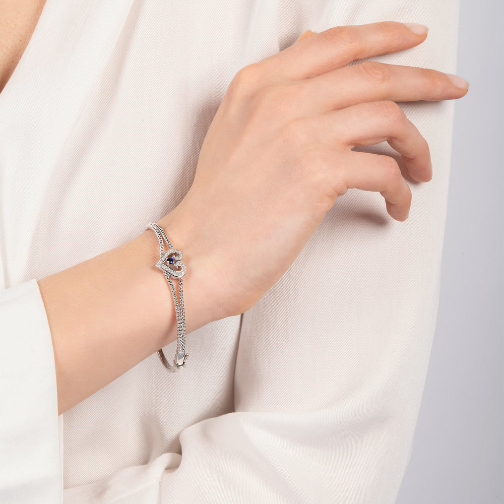Hallmark Fine Jewelry Follow Your Heart Bangle in Sterling Silver with Created Blue Sapphire & Diamonds