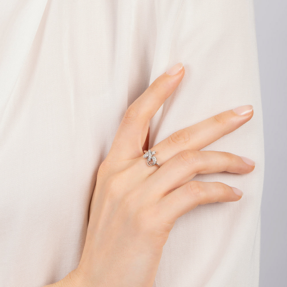 Hallmark Fine Jewelry Sculpted Hug and Kiss Ring in Sterling Silver with 1/8 Cttw of Sparkling Diamonds